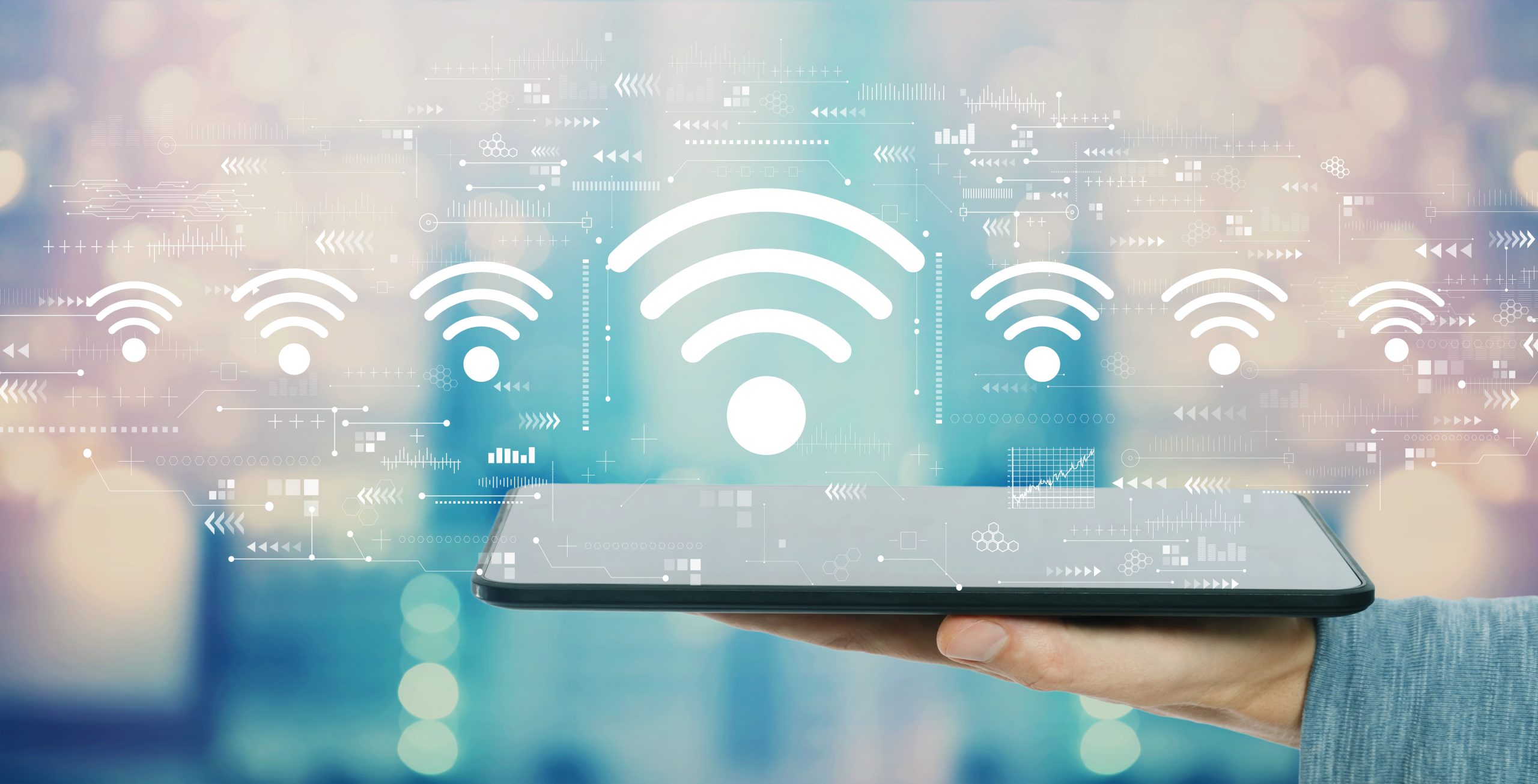 Wifi,Theme,With,Man,Holding,A,Tablet,Computer
